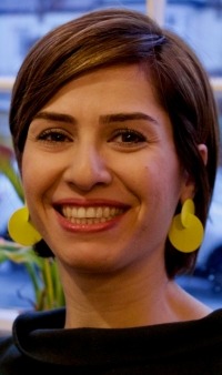Yassi Banietemad, smiling
